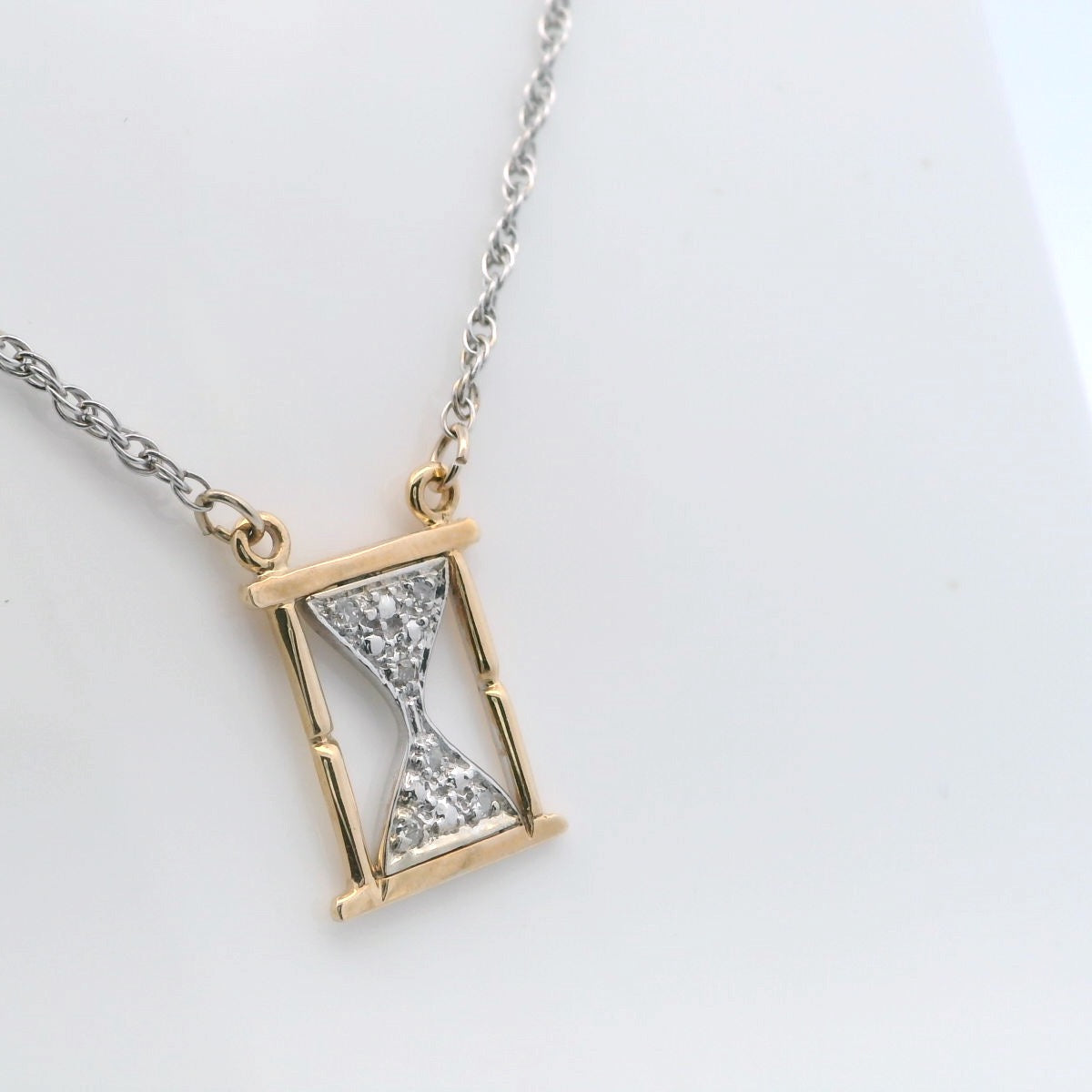Elegant Hourglass Pendant Necklace