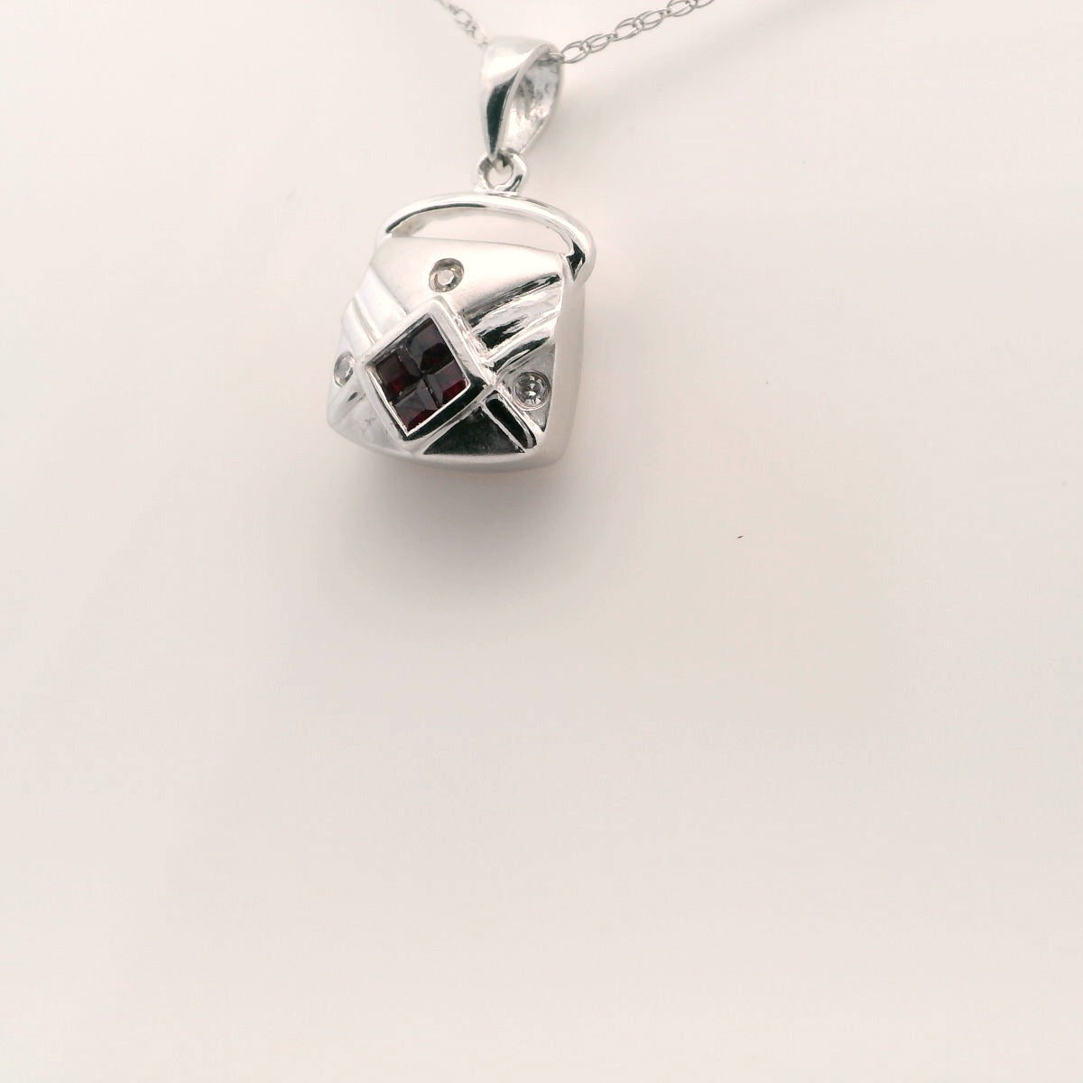 14kt white gold ruby and diamond purse. 3D
