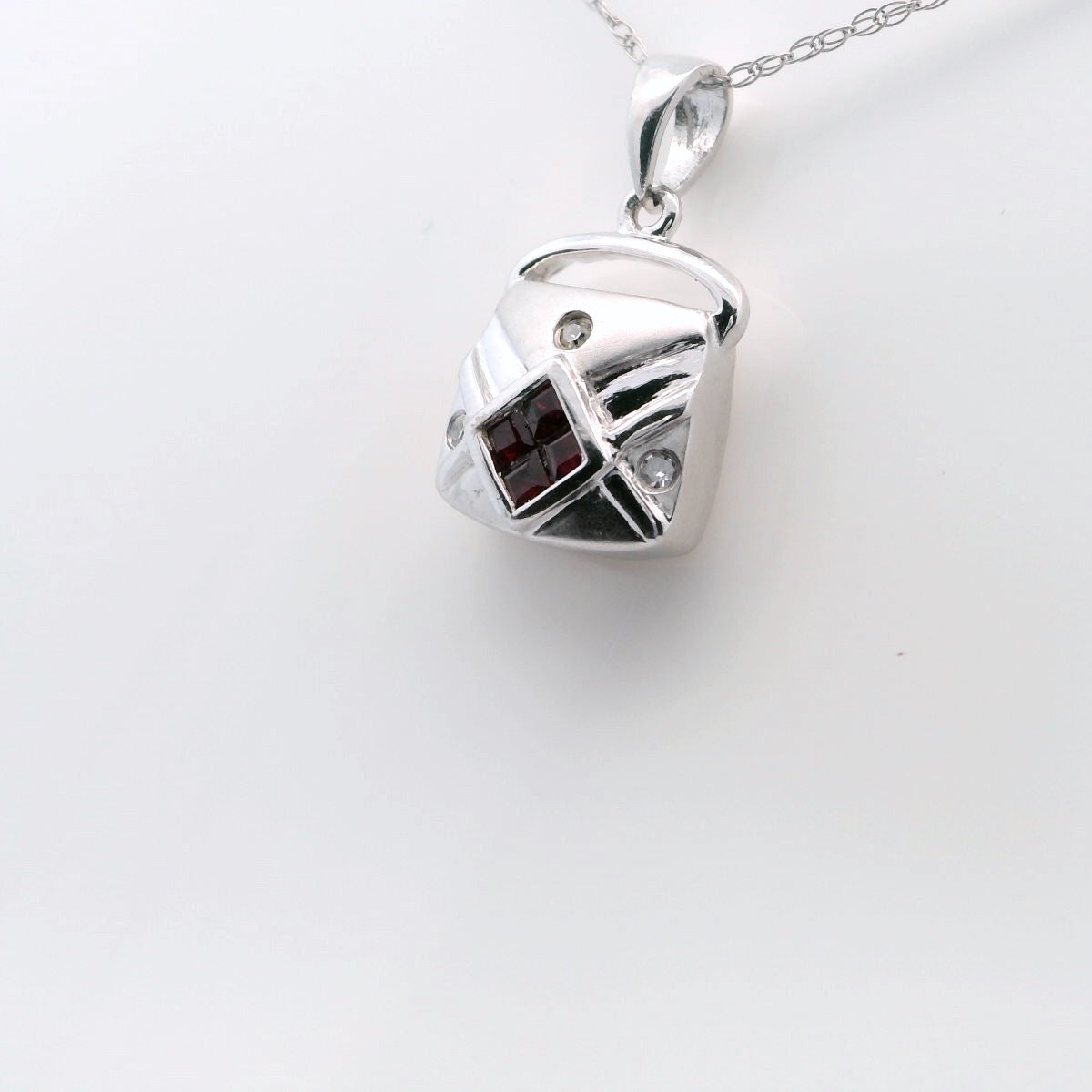 14kt white gold ruby and diamond purse. 3D