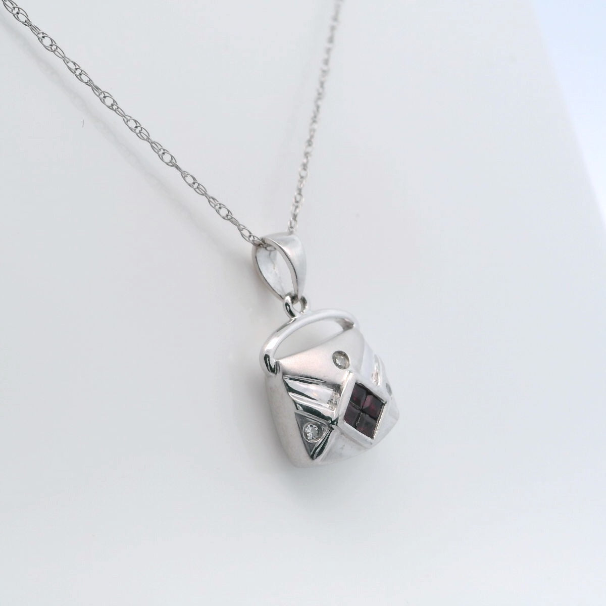 14kt white gold ruby and diamond purse. 3D
